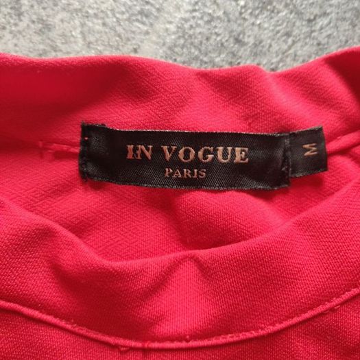 Red trousers and top set