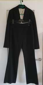 Black trousers suit.