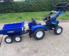 New Holland tractor and trailer