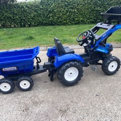 New Holland tractor and trailer