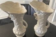 Reduced Pair of antique English Ewers  or vases  with embossed floral designs