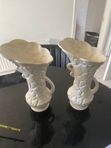 Reduced Pair of antique English Ewers  or vases  with embossed floral designs
