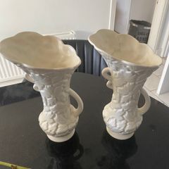 Pair of antique English Ewers  or vases  with embossed floral designs
