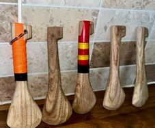 Hand made mini hurleys. Plenty of club/county colors in stock