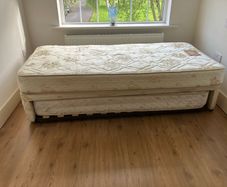 Single bed with pullout bed underneath