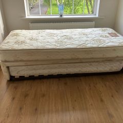 Single bed with pullout bed underneath