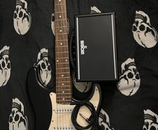 Electric guitar Stratocaster and Amp boss katana mini with cable