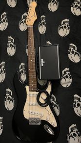 Electric guitar Stratocaster and Amp boss katana mini with cable