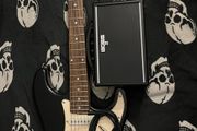 Electric guitar Stratocaster and Amp boss katana mini with cable