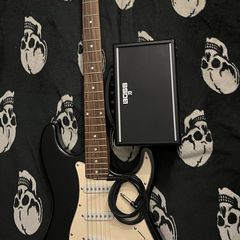 Electric guitar Stratocaster and Amp boss katana mini with cable