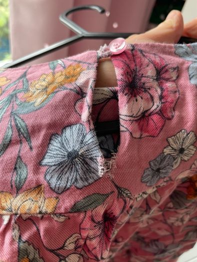 Dunnes pink floral dress with ruffle details and keyhole back