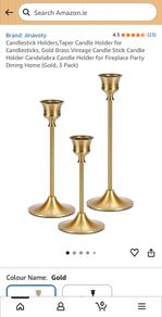 Set of 3 brass colored candle holders