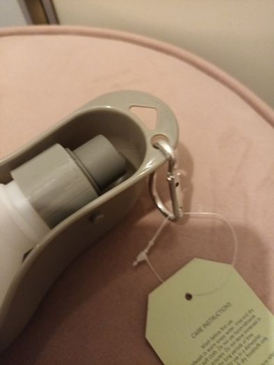 Clip on doggy water bottle and drinking tray