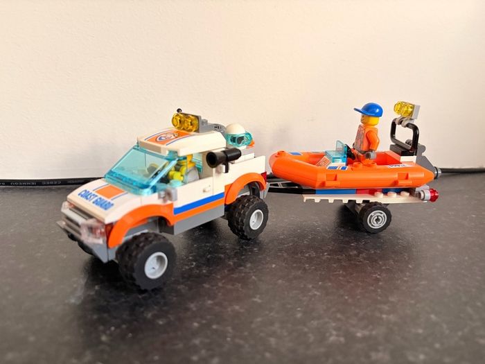 Lego City Starter Set and Driving Boat Retired Set bundle
