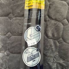 Hall door draught excluder and threshold