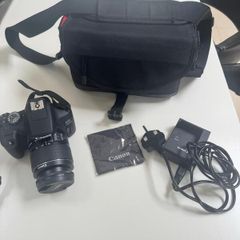 Canon 2000D Digital Camera W/ 18-55 lens.