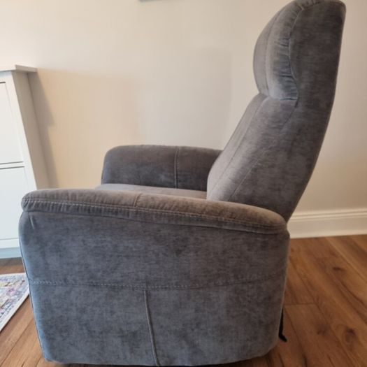 Swivel rocker reclining armchair