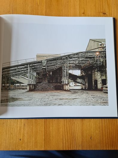 Under A GREY Sky. By Simon Burch. This Book Of Photos  Follows The landscape,people, & Towns Affected By The Collaps Of Board Na Mona's Peat Mining  Industry. IN IRELAND.
