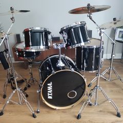 Tama 5-piece black Drum Kit with Zildjian cymbals and drum cases.