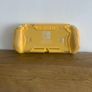 Nintendo switch console and yellow rubber cover Image 2
