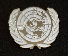 United nations, peacekeeping cap badge.
