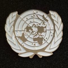 United nations, peacekeeping cap badge.