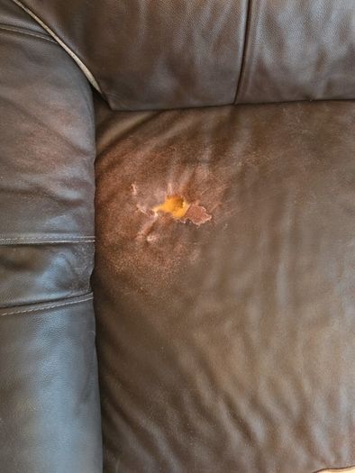 brown leather sofa - free damage but free to take for collection