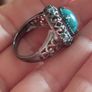 A 925 sterling silver ring with turquoise and blue topaz. Image 7