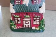 Vintage winter cottage battery candle.