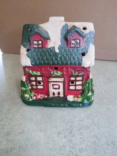 Vintage winter cottage battery candle.