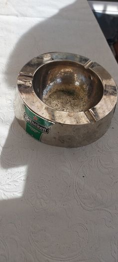 Heineken metal ashtray ,used condition, still nice condition ,buyer collects or pays postage thank you, sold as is,