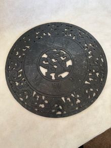Carved  stone disc