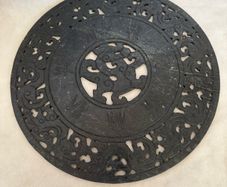 Carved  stone disc