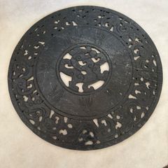 Carved  stone disc