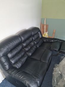 Leather sofa with leather armchair