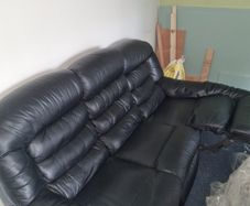 Leather sofa with leather armchair