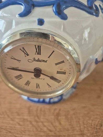 Blue and white ceramic teapot with quartz clock