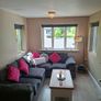 Immaculate Right-Hand Corner Sofa & Matching 2-Seater  Modern grey fabric right-hand corner sofa with matching 2-seater. Image 5