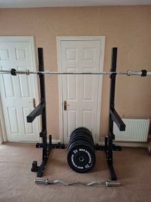 Hit Fitness Squat Stands + Mirafit Spotter Arms + 150kg Olympic Bumper Plates + Olympic Bar & EZ Curl Bar