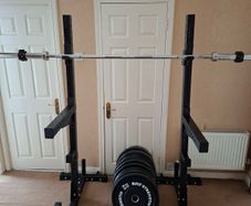 Hit Fitness Squat Stands + Mirafit Spotter Arms + 150kg Olympic Bumper Plates + Olympic Bar & EZ Curl Bar