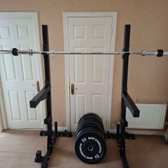 Hit Fitness Squat Stands + Mirafit Spotter Arms + 150kg Olympic Bumper Plates + Olympic Bar & EZ Curl Bar