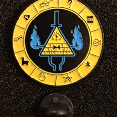 Bill cipher/gravity falls,  pin back badge.