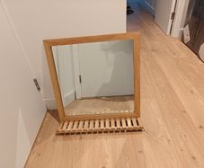 Mirror with shelf
