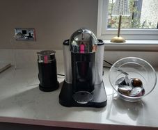 Nespresso coffee machine frother and pod holder