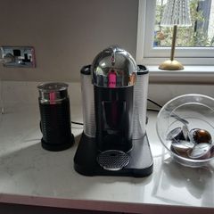 Nespresso coffee machine frother and pod holder