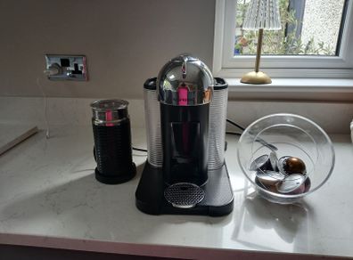 Nespresso coffee machine frother and pod holder