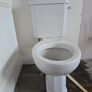 4 traditional style white ceramic toilets available for sale. Image 2
