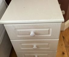 Painted light pink bedside locker