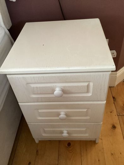 Painted light pink bedside locker