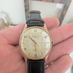 This is a vintage Cadola manual-wind mechanical wristwatch dating from approximately the 1950s to the 1960s.